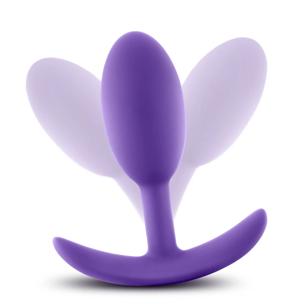 Purple silicone anal plug with curved base and wing-like flaps luxe luxe wearable vibra slim medium size