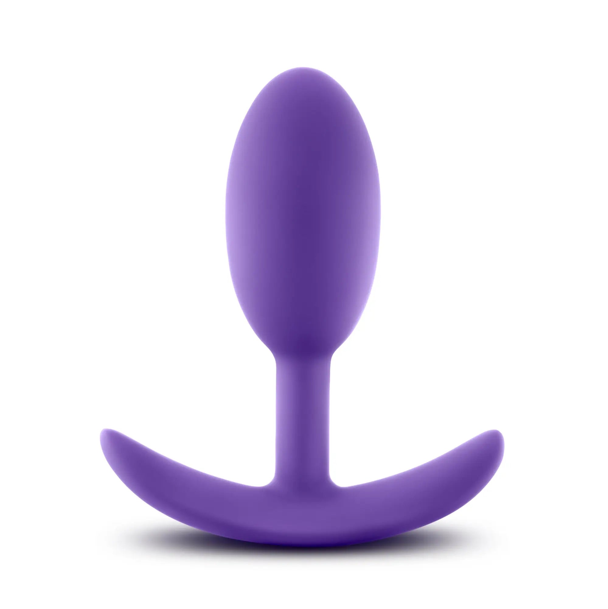 Purple silicone butt plug with curved stable base from luxe luxe wearable vibra slim plug medium purple collection