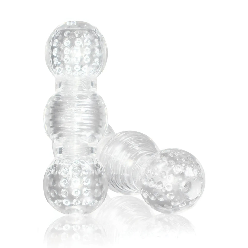 Clear transparent silicone stroker toy with textured bubble spheres and ribbed sections from m for men master stroker clear