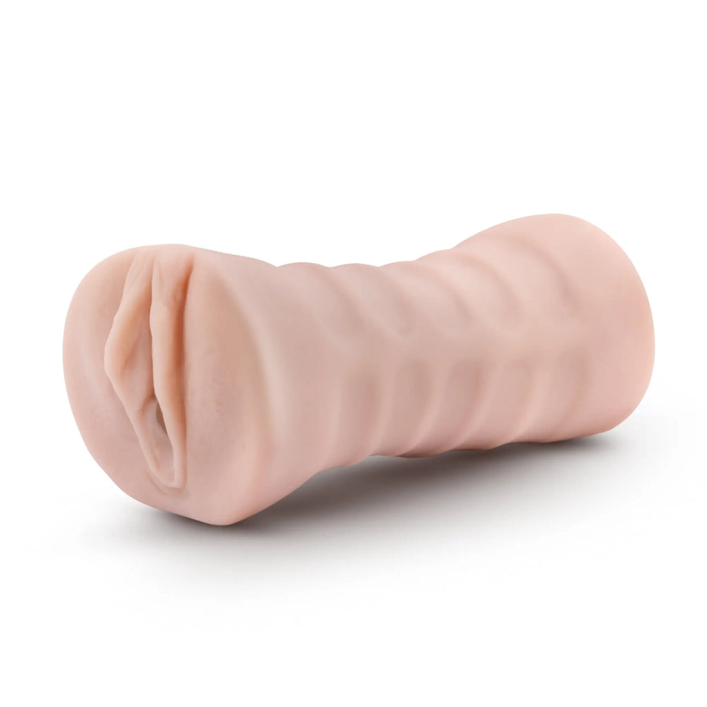 Pink silicone anal plug with textured ridges and tapered realistic design from m for men rain vanilla collection