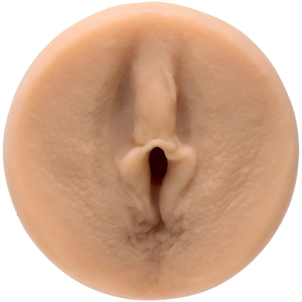 Beige silicone anal plug with realistic textured surface and central opening from main squeeze ariana marie ultraskyn stroker pussy vanilla