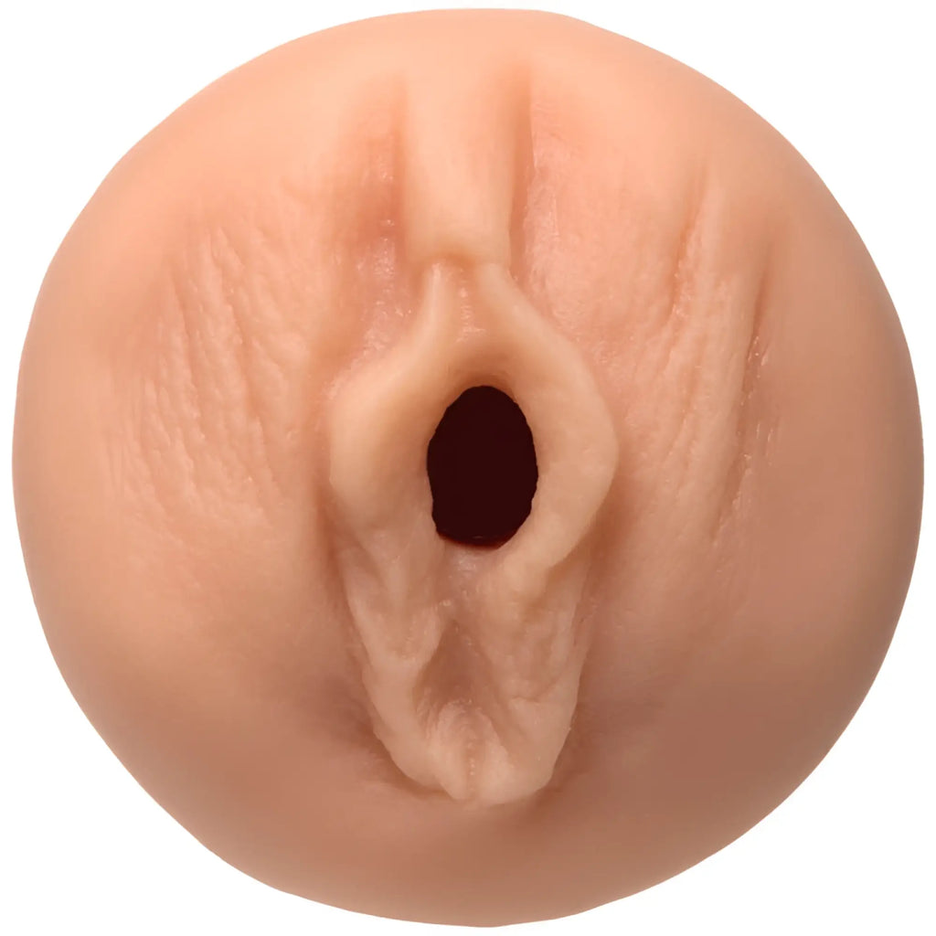 Beige silicone anal plug with realistic textured surface and central opening from main squeeze dani daniels pussy vanilla