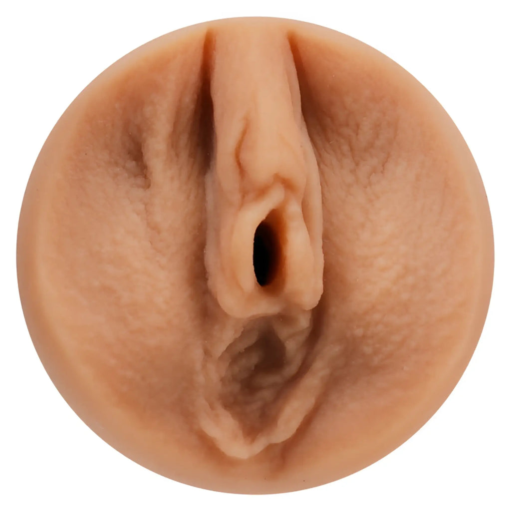 Beige silicone anal plug with realistic textured surface and central opening for main squeeze julia ann ultraskyn stroker pussy vanilla