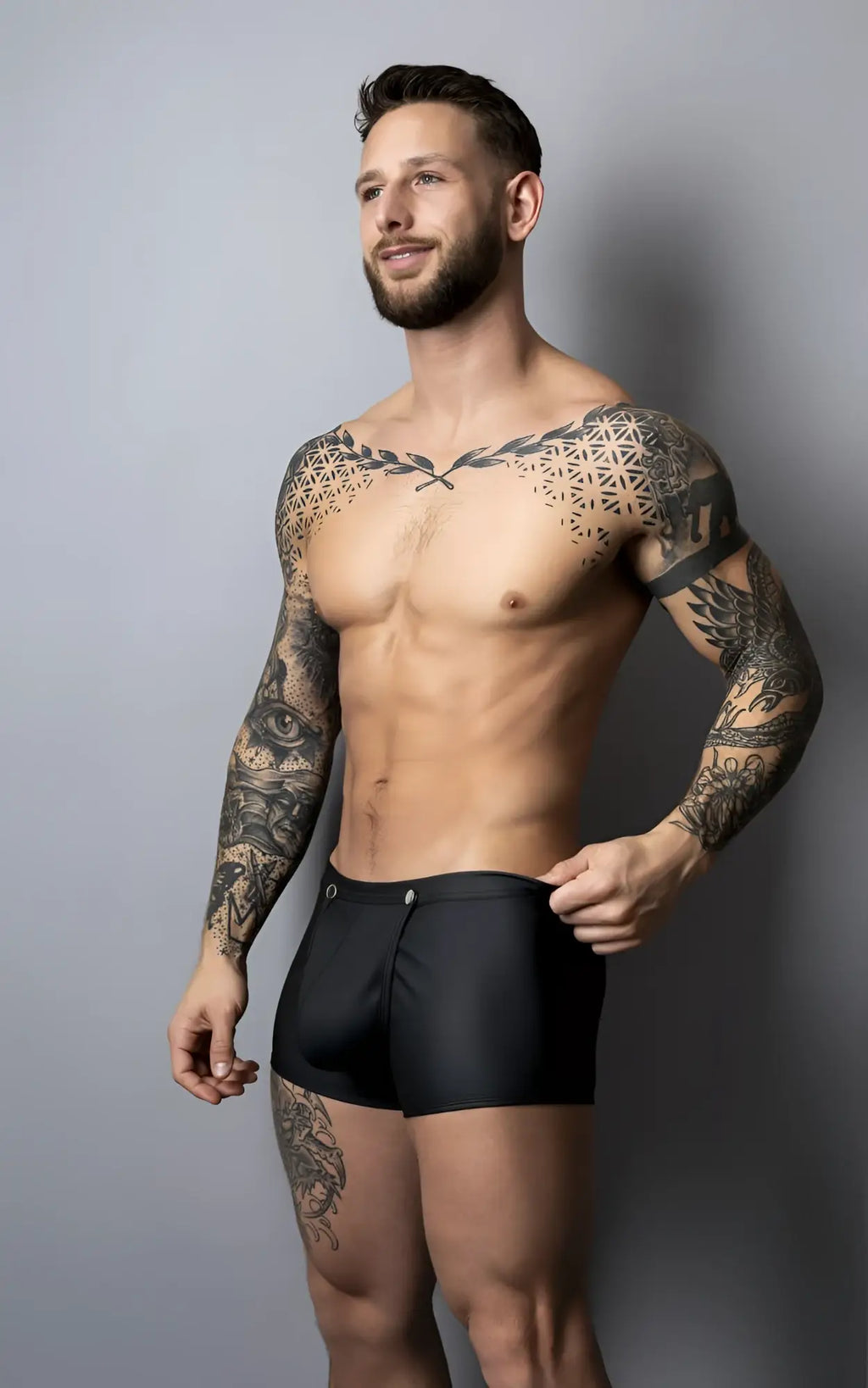 Male power 120-298 oh snap snap off short in black sleek form-fitting swim trunks with subtle front zipper detail