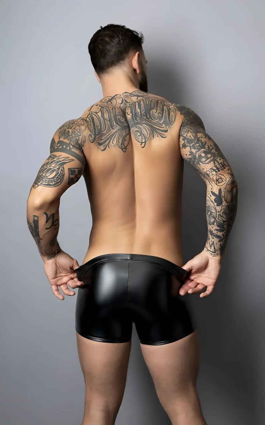 Black glossy latex shorts with pouch design by Male Power in liquid onyx 2.0 color black