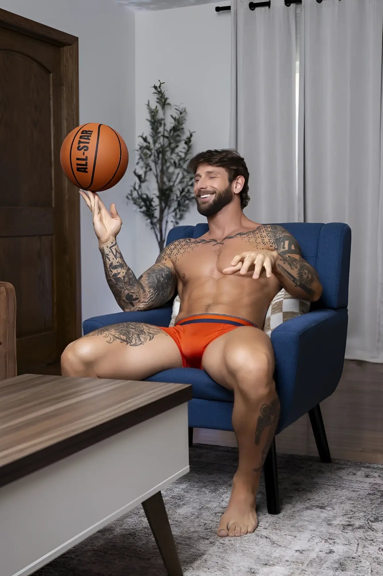Male power soo cumfy boxer brief in orange featuring a basketball design with black all-star lettering