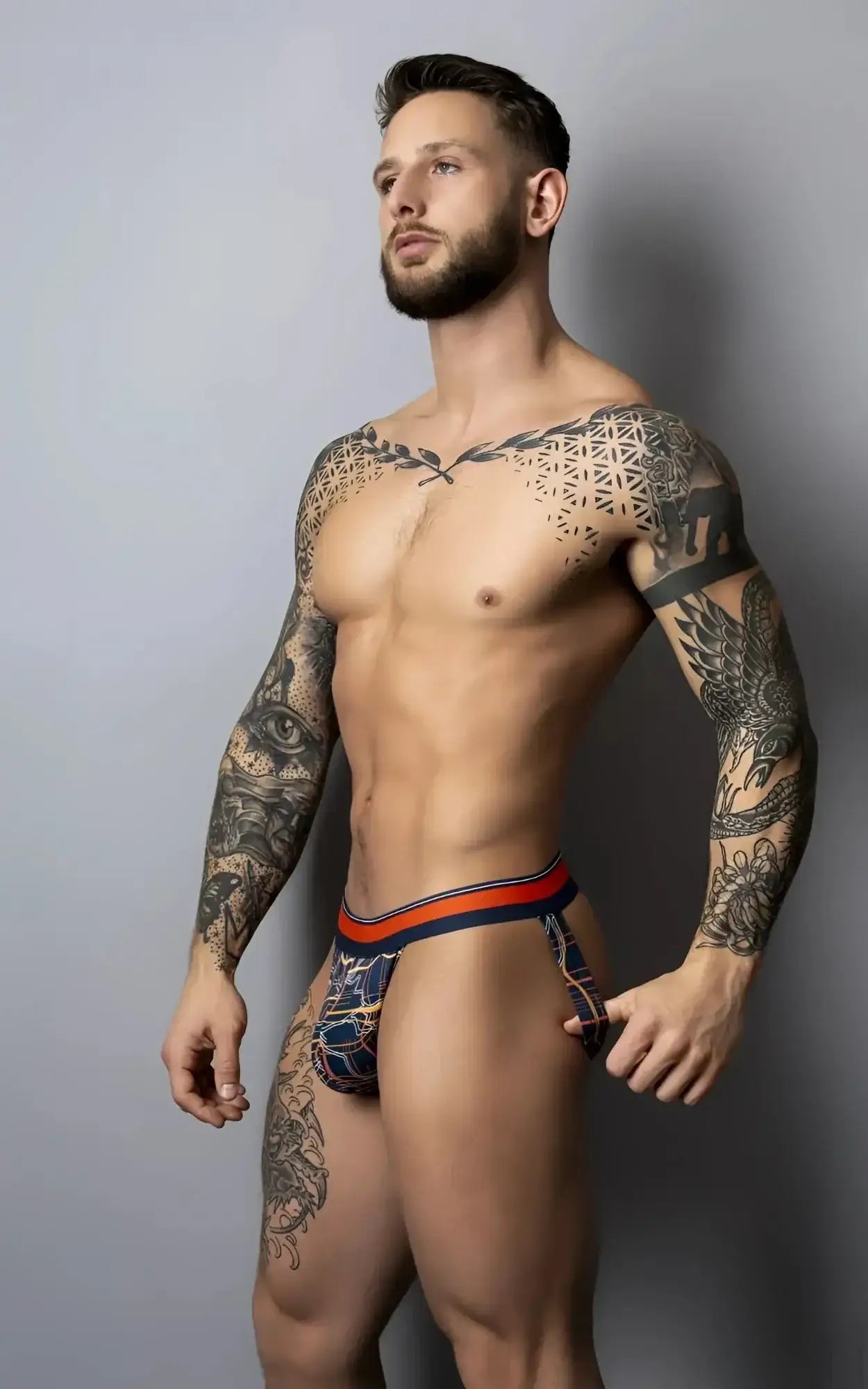 Male power 349-299 soo cumfy jockstrap in navy with blue and orange geometric patterned fabric for comfortable wear