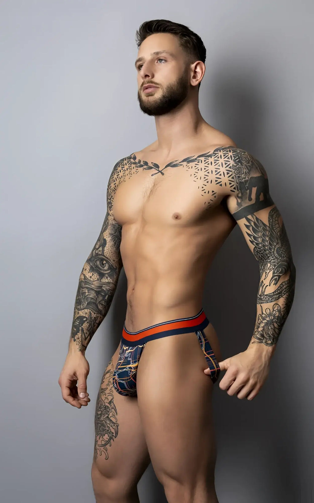 Male power 349-299 soo cumfy jockstrap in navy with blue and orange geometric patterned fabric for comfortable wear
