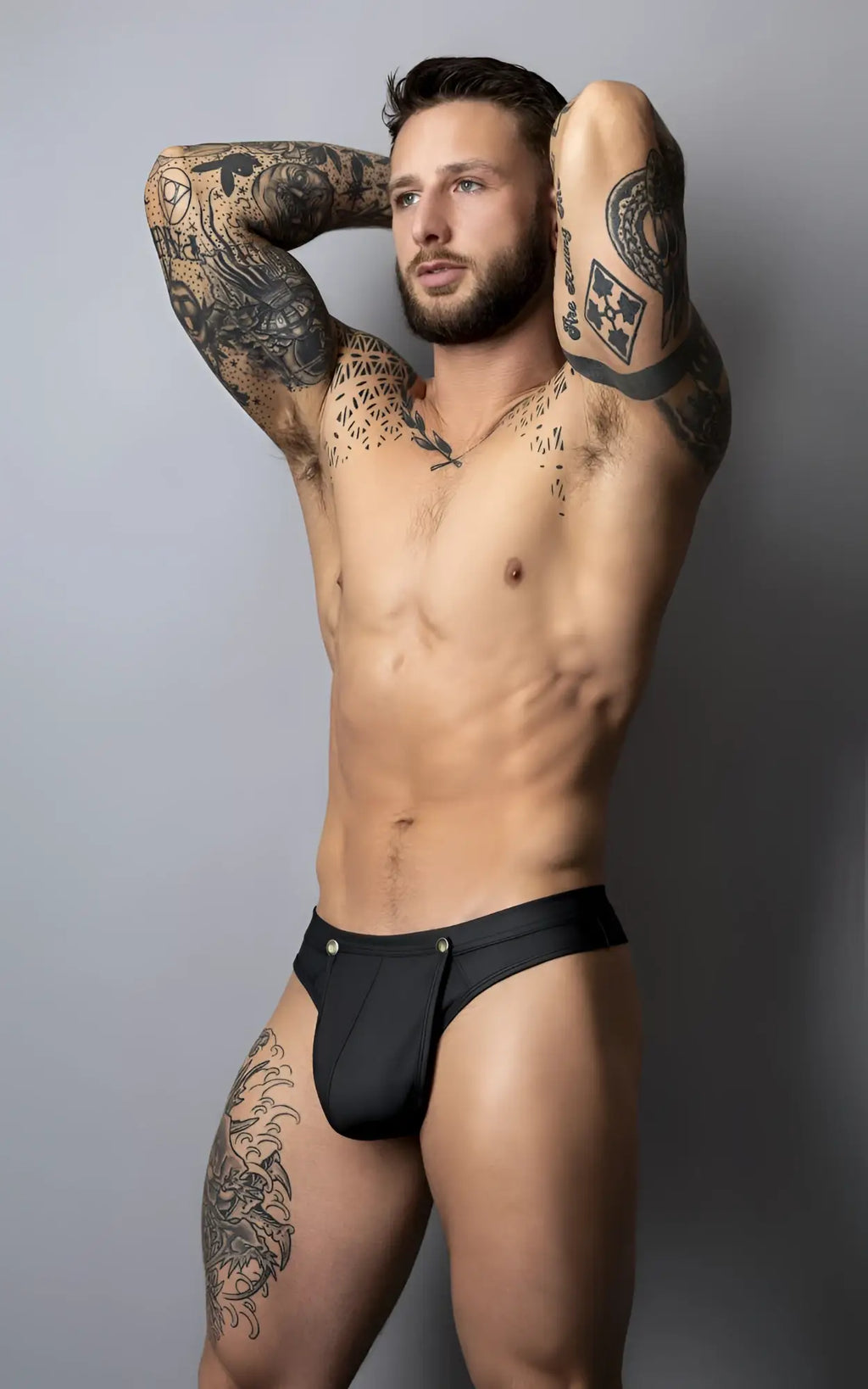 Black sleek men’s briefs male power 410-298 oh snap snap off thong with metallic button detail at waistband