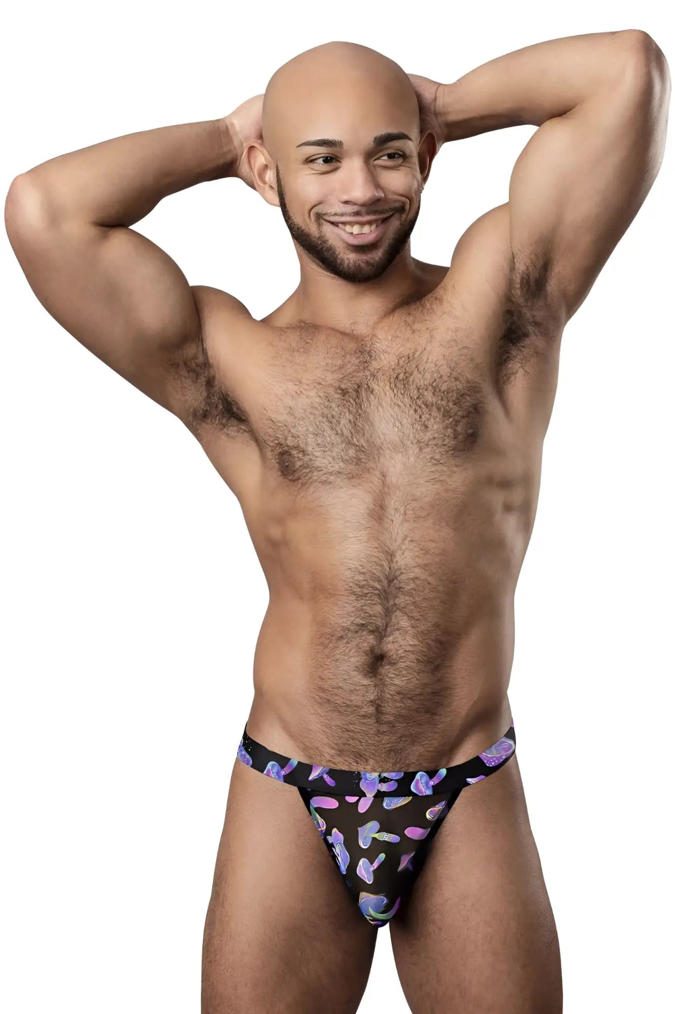 Male power 433-294 hazy dayz micro thong featuring a black base with vibrant purple and pink abstract mushroom pattern