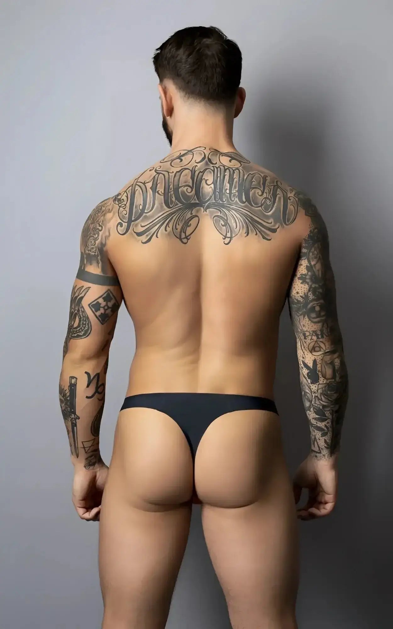 Black red male power 442-300 hot mesh thong with smooth form-fitting design shown from the back side