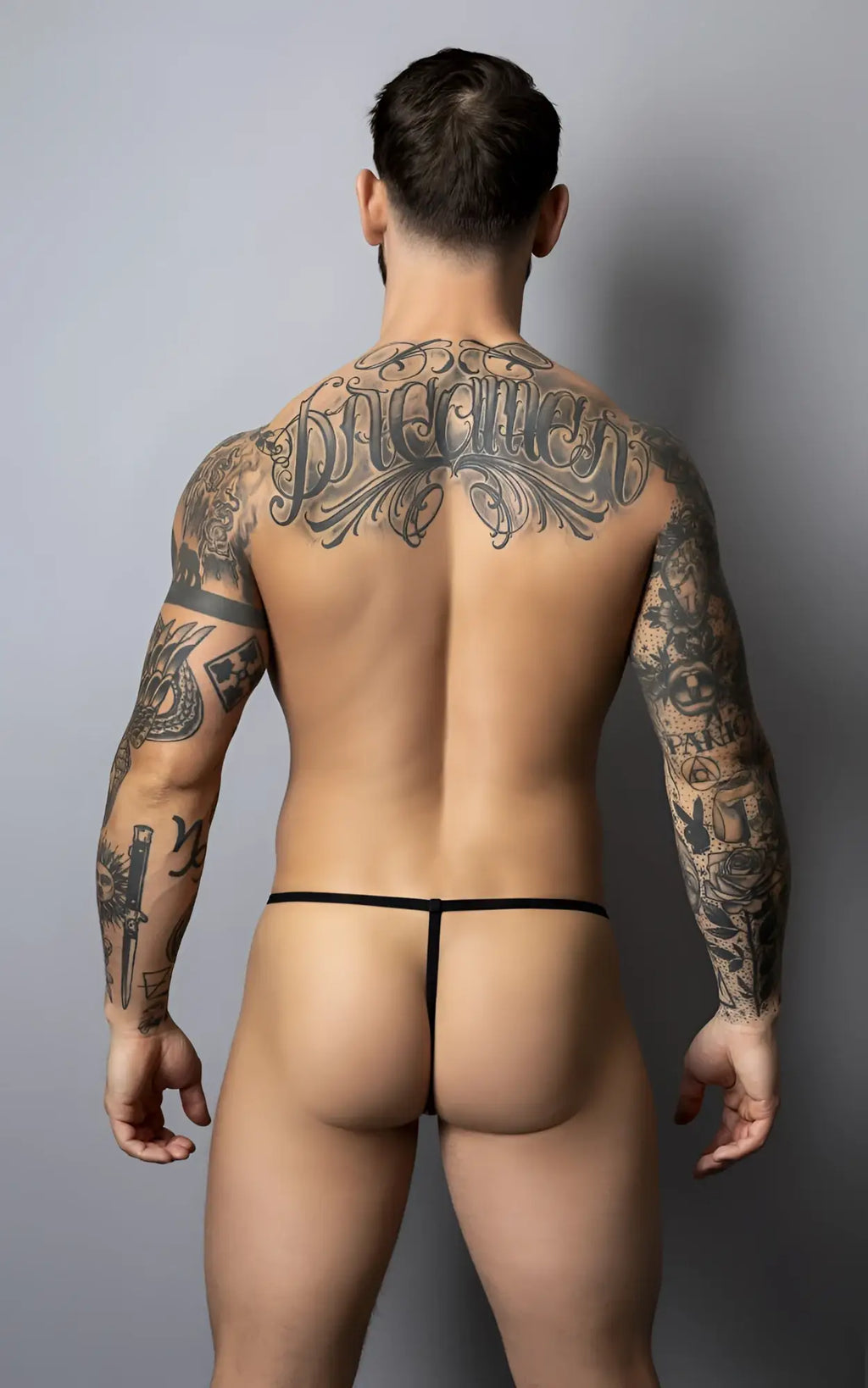 Black male power 450-301 liquid onyx 2.0 g-string thong with thin minimalist design shown from the back