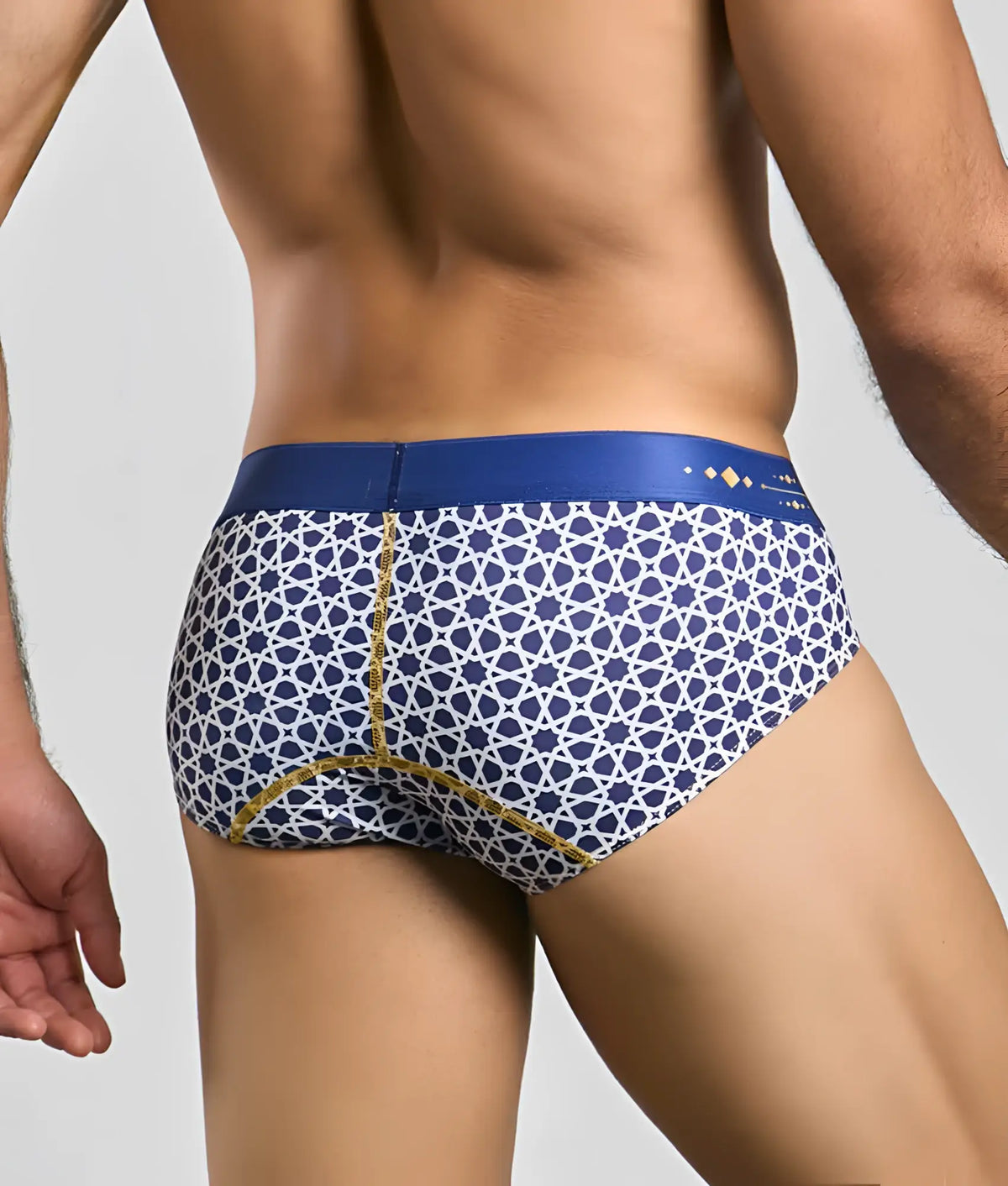 Malebasics hipster brief featuring blue and white patterned fabric with gold trim for comfortable daily wear