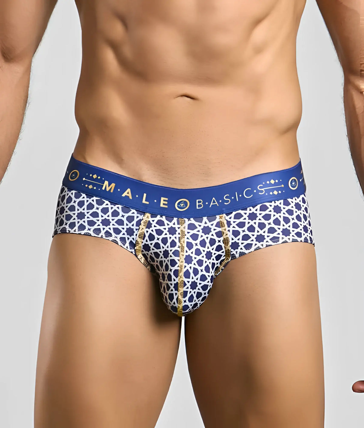 Malebasics hipster brief in blue and white patterned fabric with gold trim and a male basics waistband