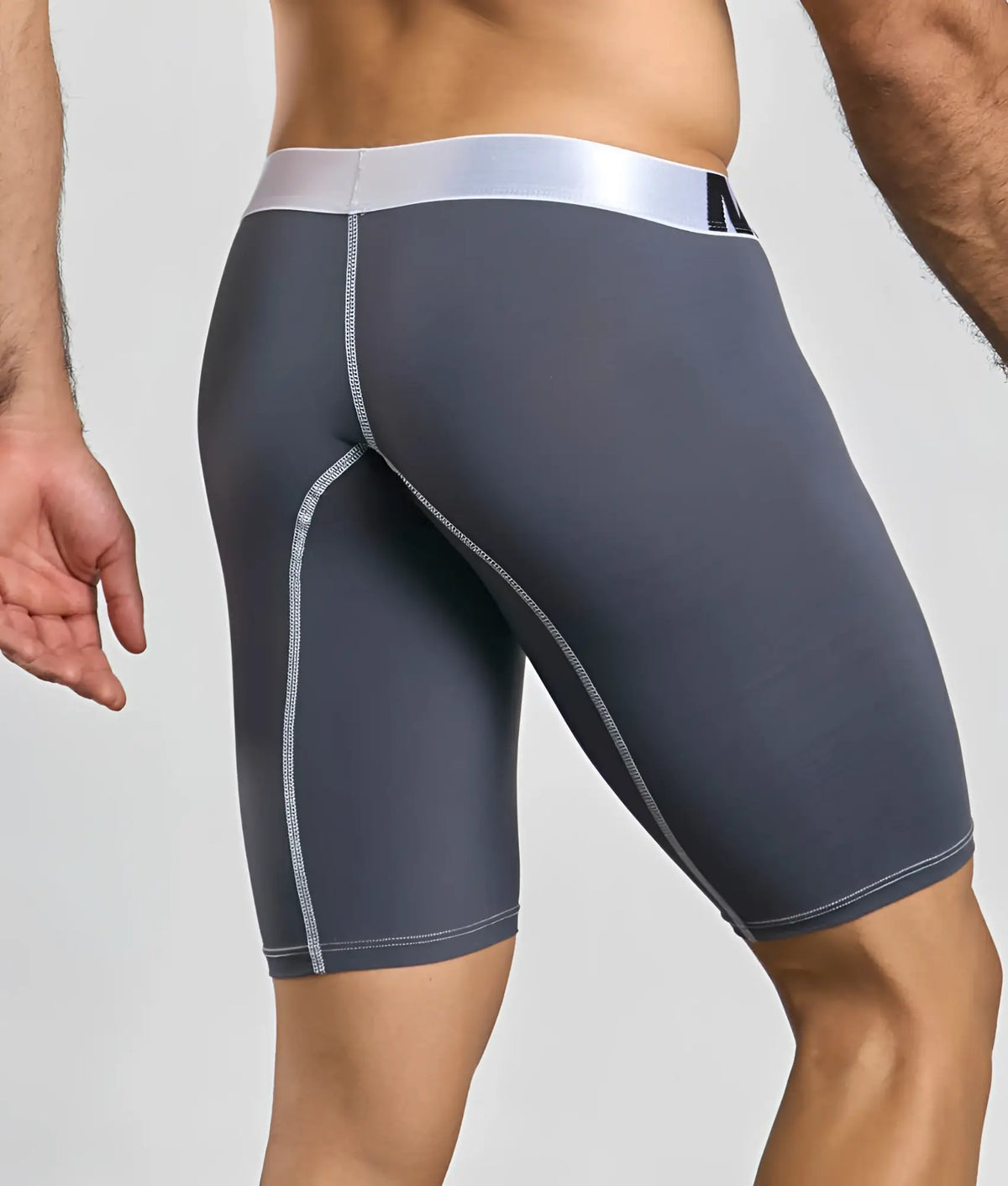 Dark gray microfiber malebasics athletic boxer with silver waistband and matching seam stitching for active wear