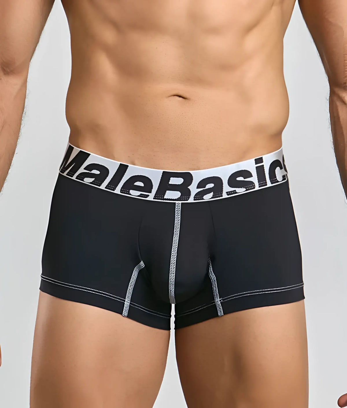 Black malebasics microfiber boxer briefs with white elastic waistband bold black lettering and silver seam stitching