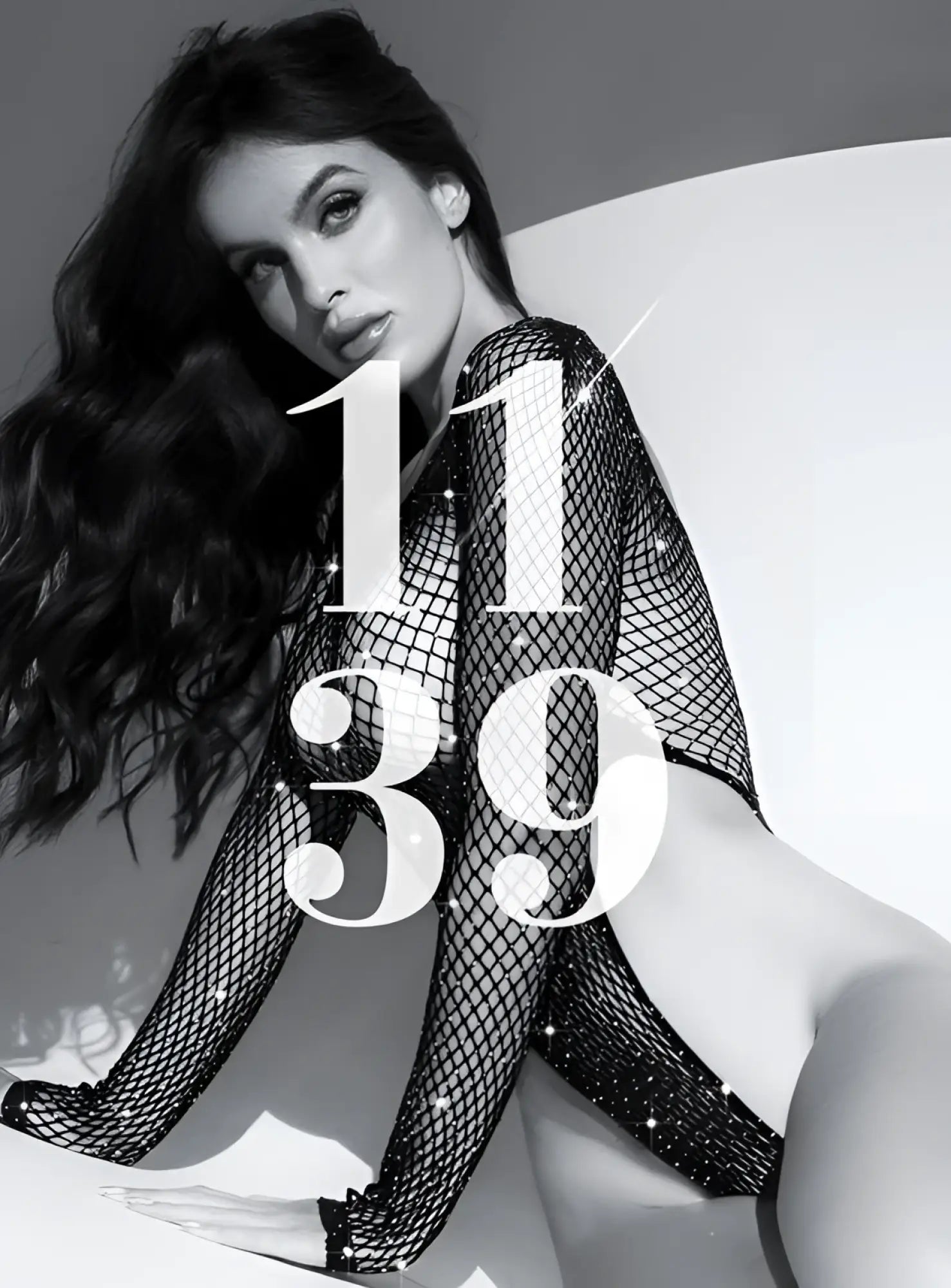 Mapale 1139 long sleeve black fishnet bodysuit with sparkling rhinestone embellishments and glittery texture