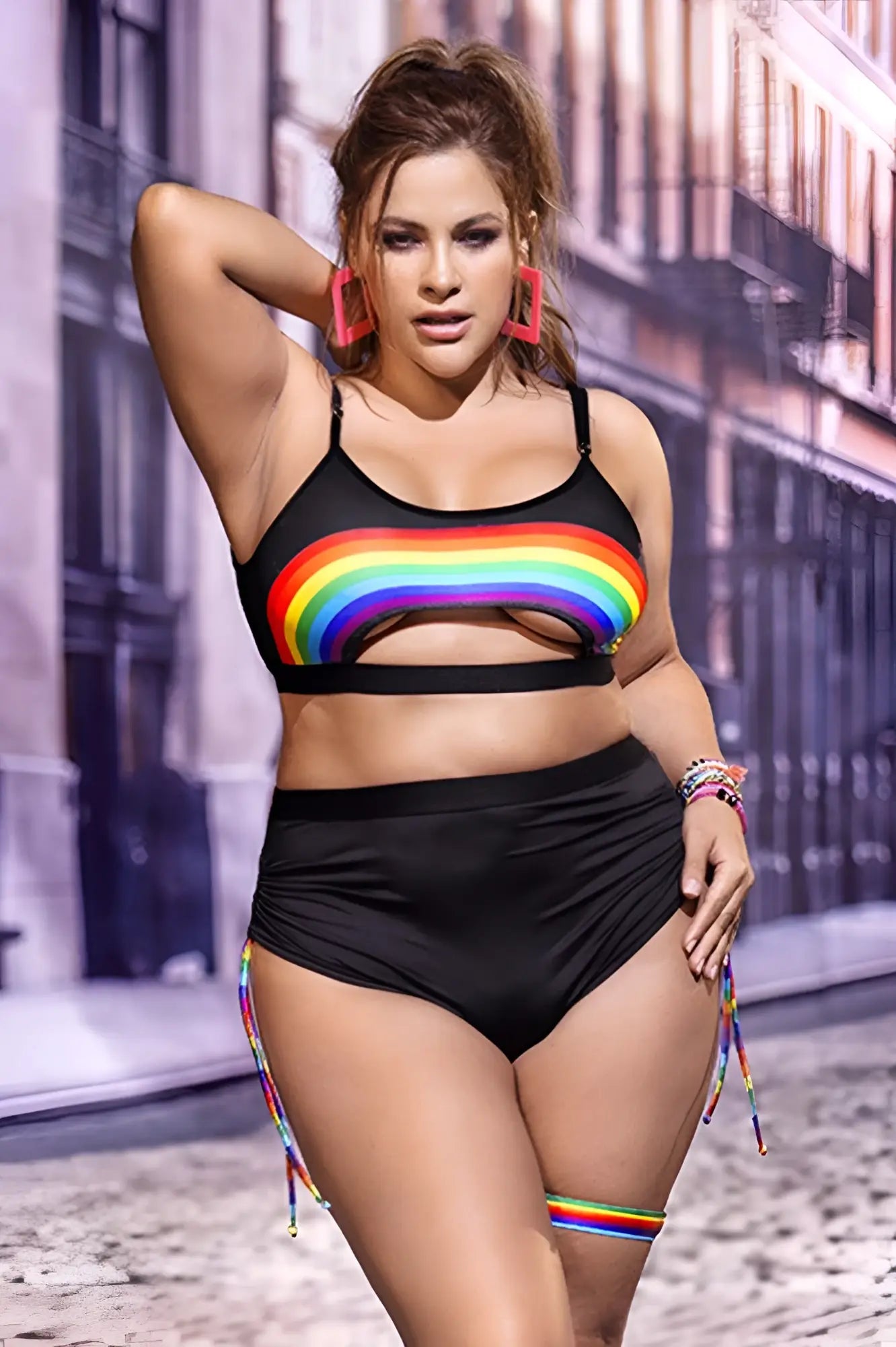 Black two-piece swimsuit by Mapale 2689X with rainbow stripe and matching trim on side ties for stylish beachwear