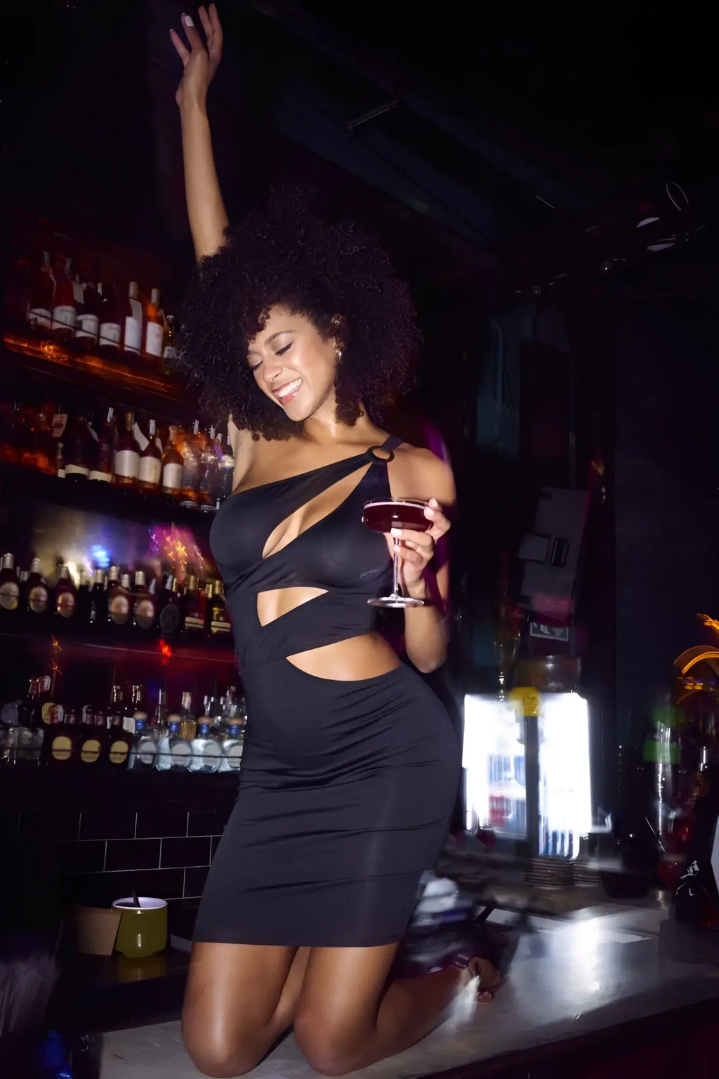 Black one-shoulder cut-out dress by Mapale 40004 featuring sleek fabric for stylish evening wear