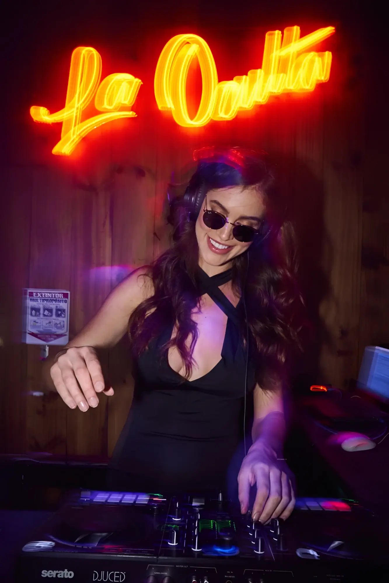 Black serato dj controller with illuminated buttons and knobs under neon lighting for Mapale 40007 dress black