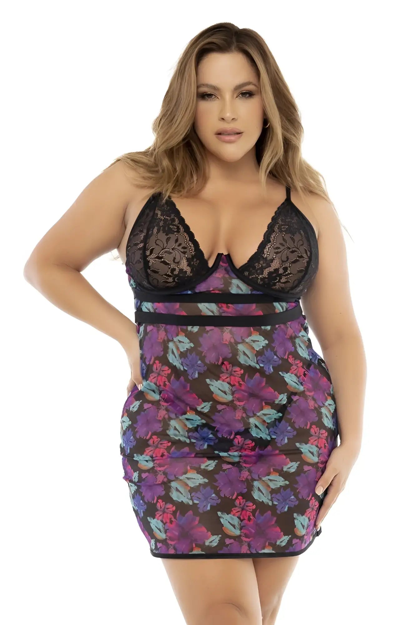 A plus-size woman modeling the Mapale 7497X babydoll with black lace bodice and sheer multicolored floral skirt