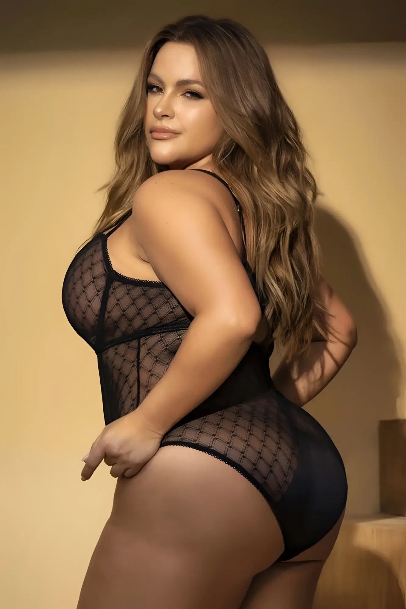 Black mesh bodysuit with lattice pattern and thin straps by Mapale model 8781X in black color