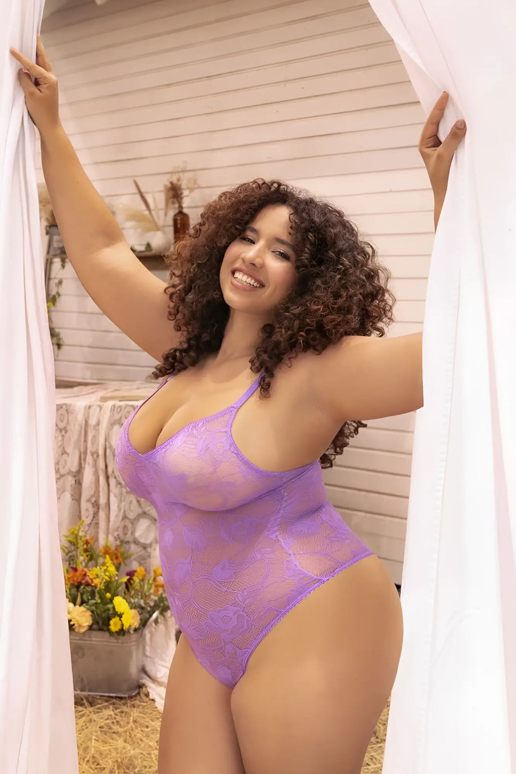 Purple lace bodysuit in wild orchid with a sheer patterned design from mapale 8950x collection