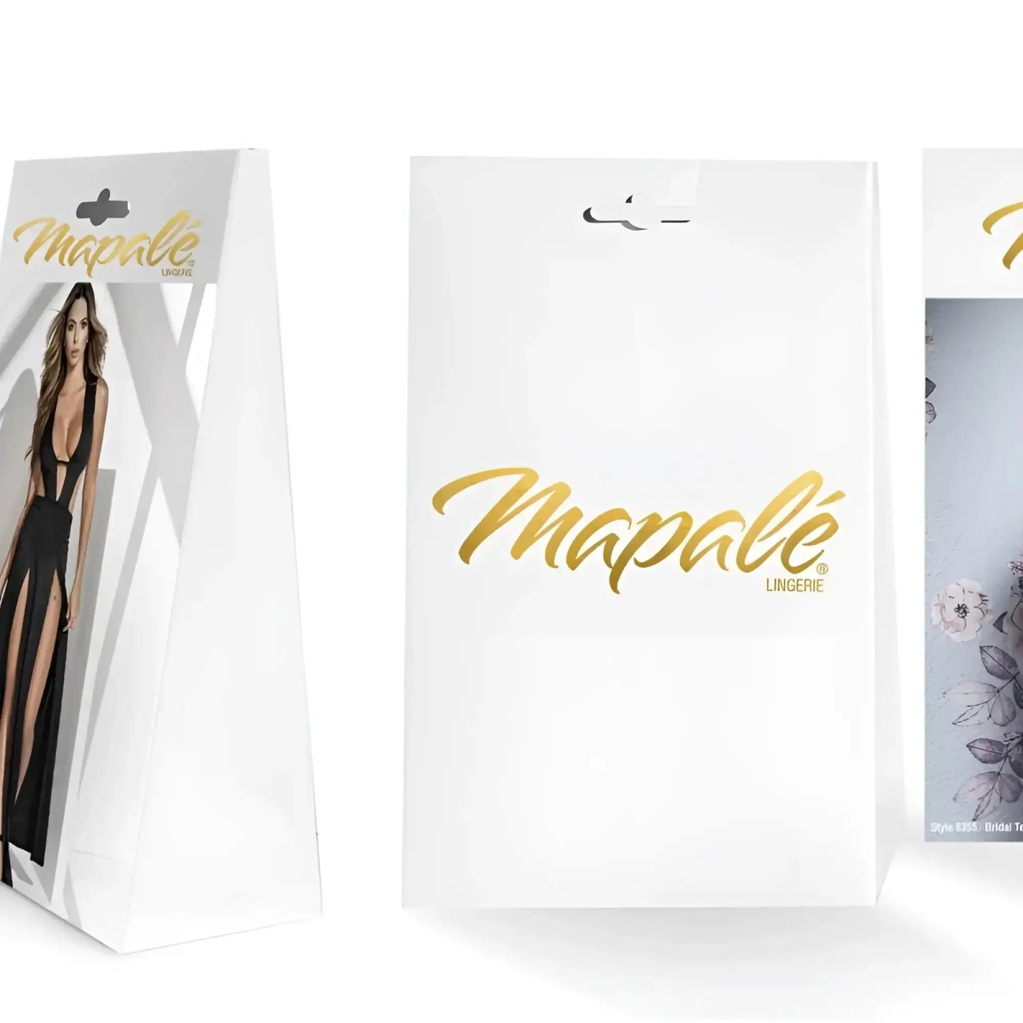 White Mapale lingerie packaging with gold foil lettering and a black attire model for Mapale sexy lace thong orange XL