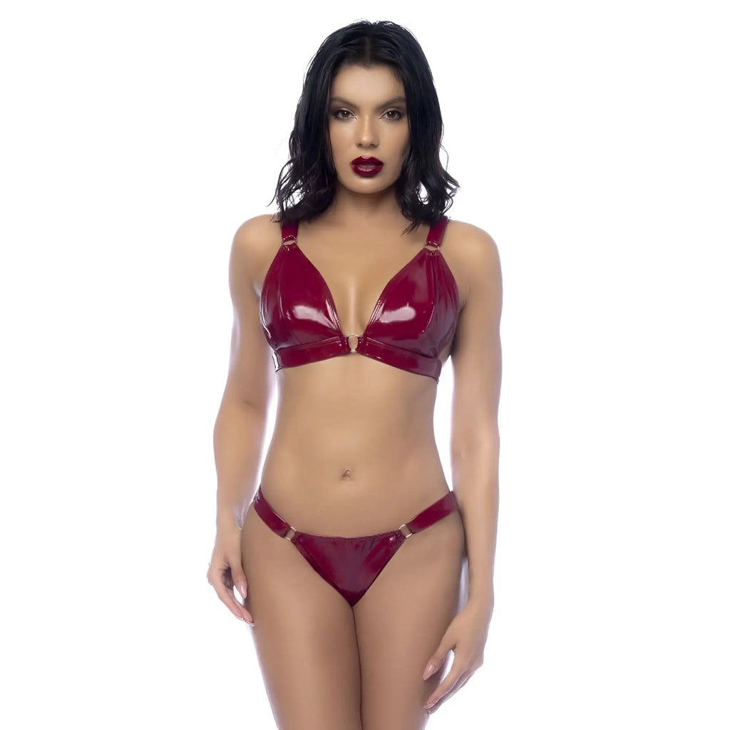 A deep red glossy latex bra and thong set with metallic gold-toned hardware from mapale wet look vinyl collection