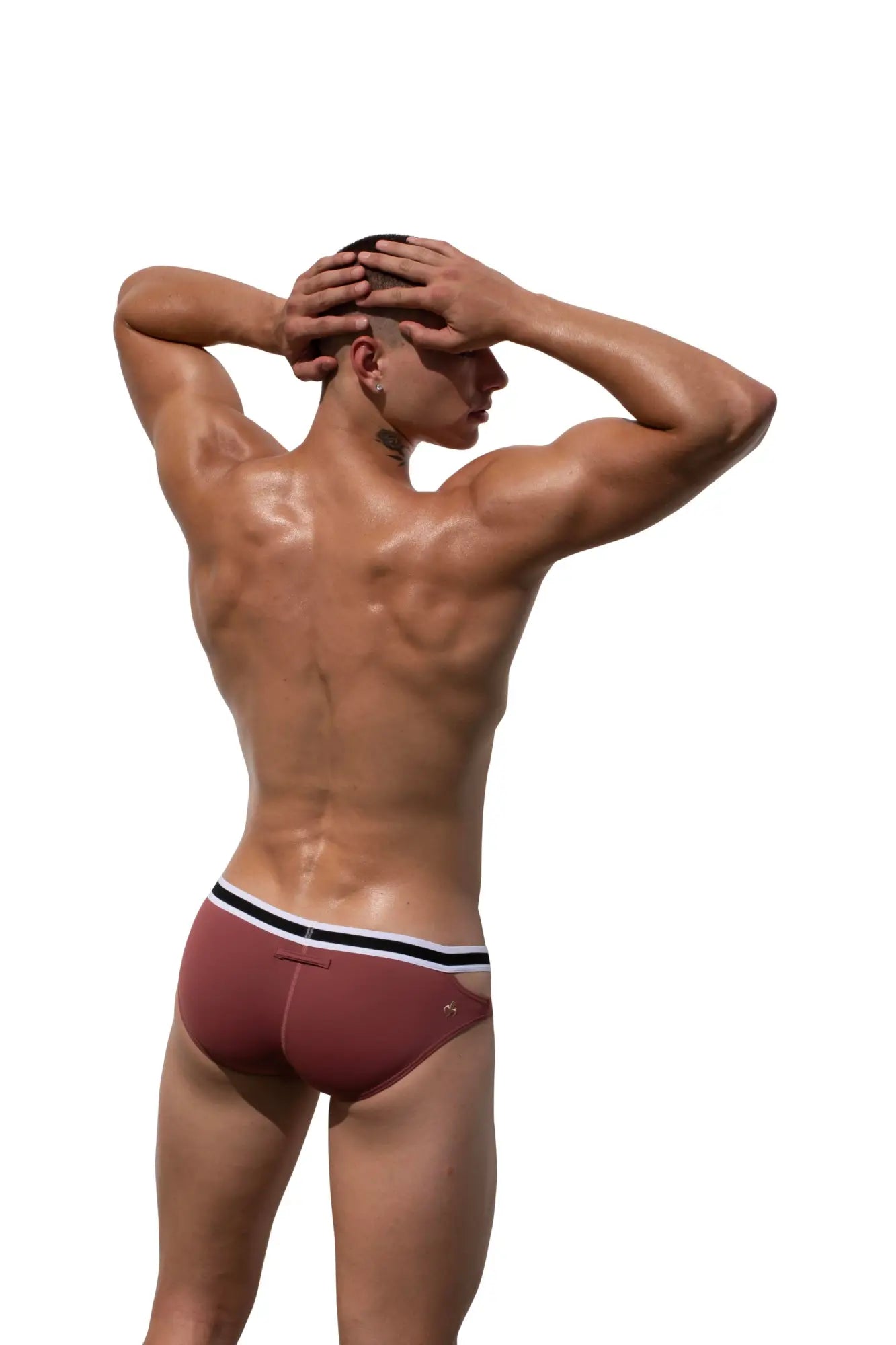 Marcuse alexander brief underwear featuring maroon athletic briefs with a black and white striped waistband