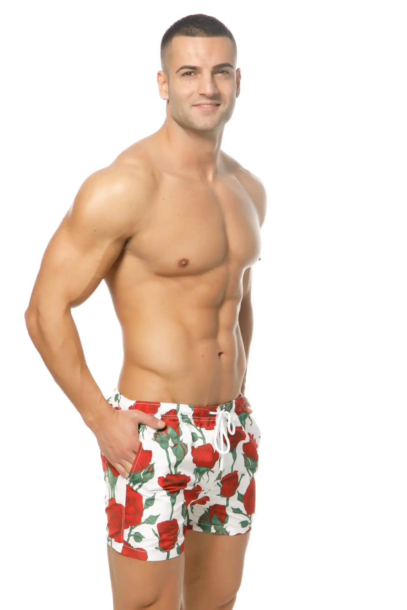 Marcuse amour shorts white swim trunks with vibrant red rose pattern green stems and white drawstring accents