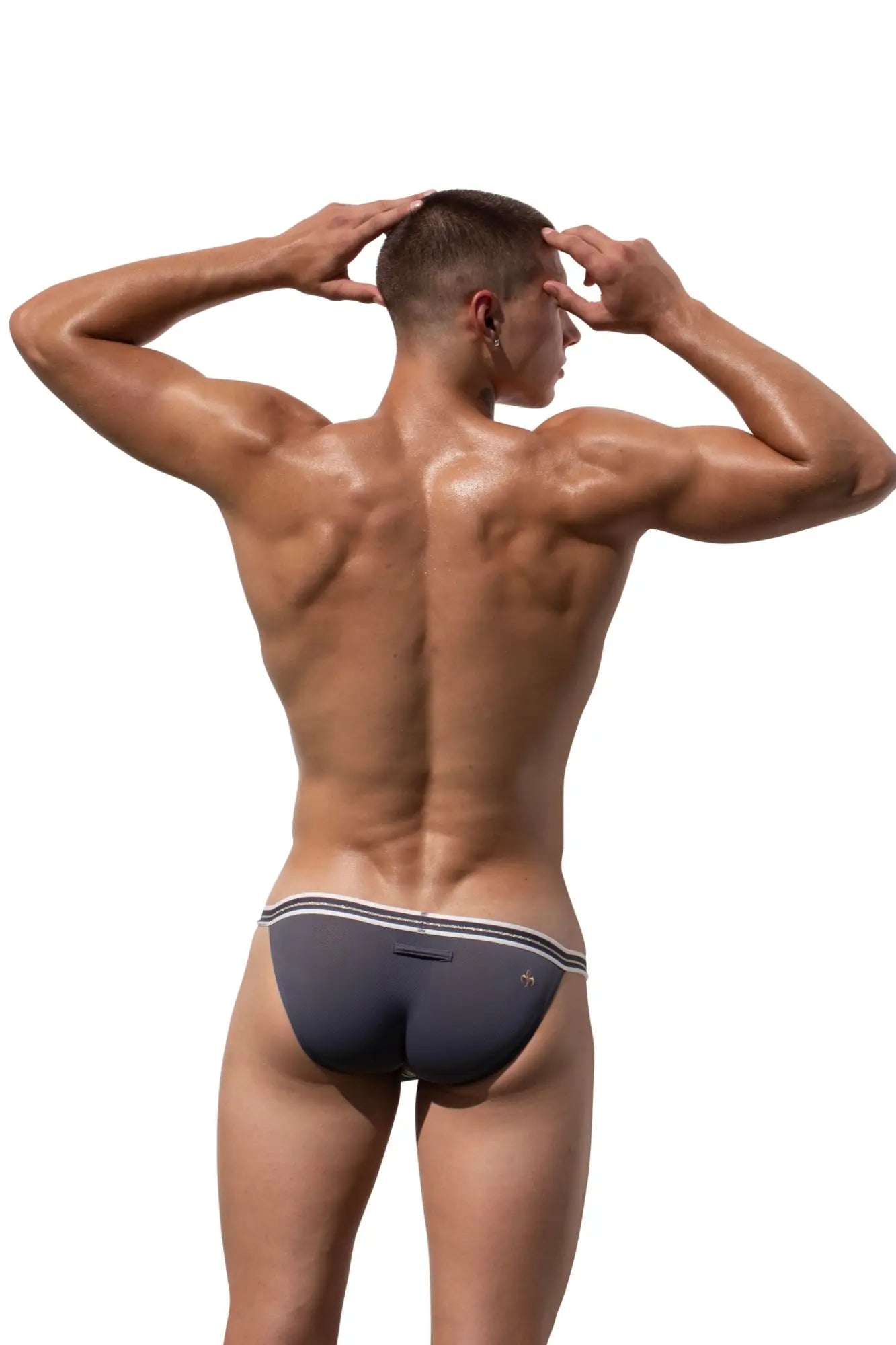 Dark gray marcuse arose brief underwear with white trim and small logo on the back side