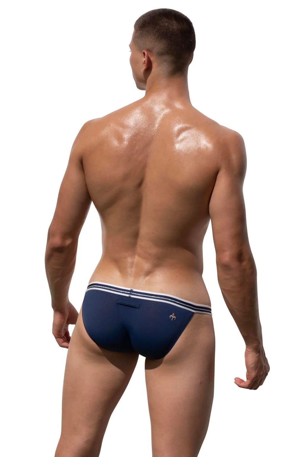 Back view of navy blue Marcuse Arose brief underwear with white trim and a small logo on the back