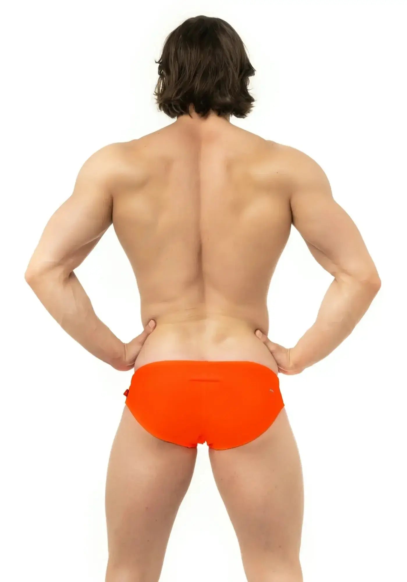 Bright orange Marcuse Arrest Me bikini swimwear swim trunks designed for vibrant beach and pool use