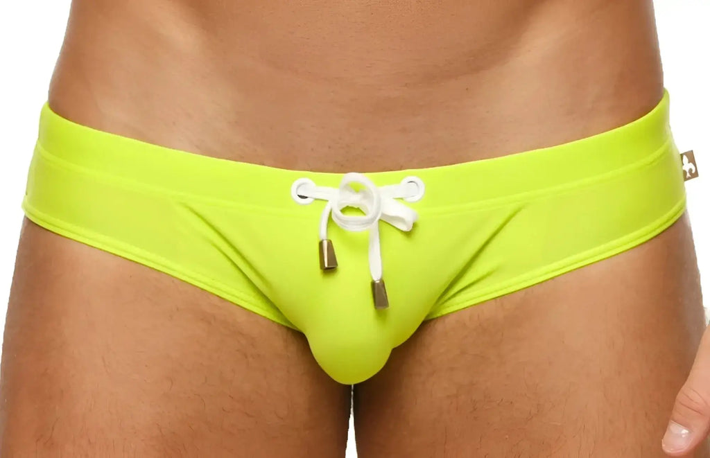 Marcuse Arrest Me bikini swimwear vibrant lime green swim trunks with white drawstring and metallic aglets