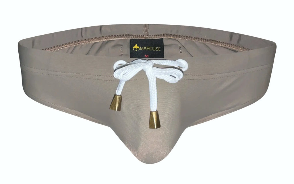Beige Marcuse Arrest Me bikini swim trunks with white drawstring and gold-tone aglets for beachwear