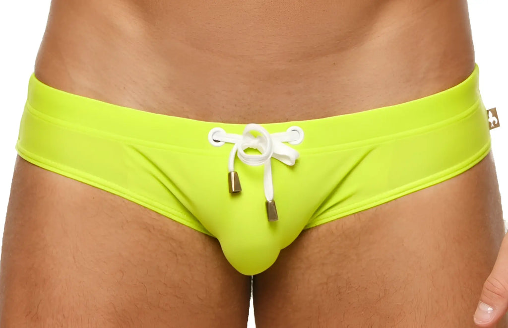 Marcuse Arrest Me bikini swimwear vibrant lime green swim trunks with white drawstring and metallic aglets