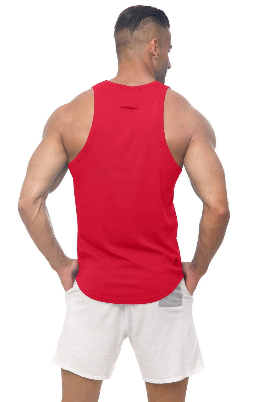 Red sleeveless marcuse avalon tank top with curved hem and subtle back seam detail shown from the back