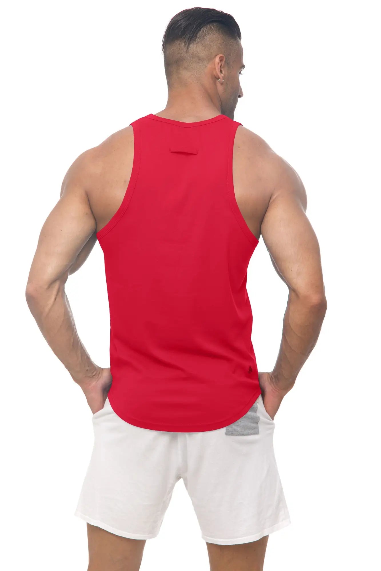 Red sleeveless marcuse avalon tank top with curved hem and subtle back seam detail shown from the back