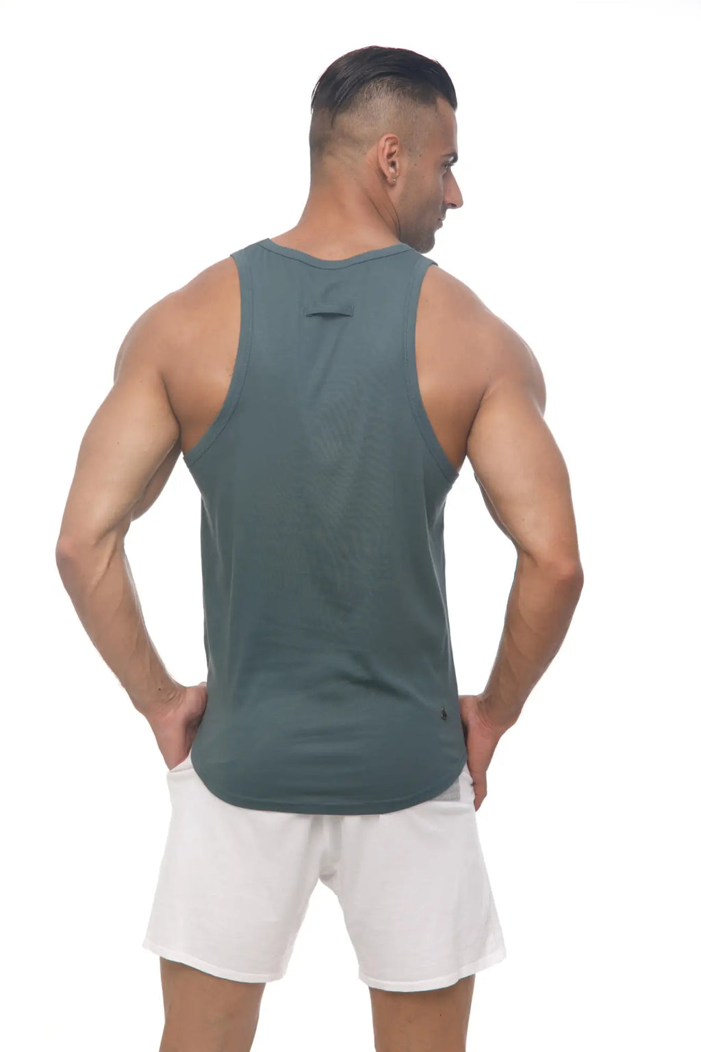 Marcuse Avalon tank top in dark teal sleeveless design with round neckline and subtle seam detailing