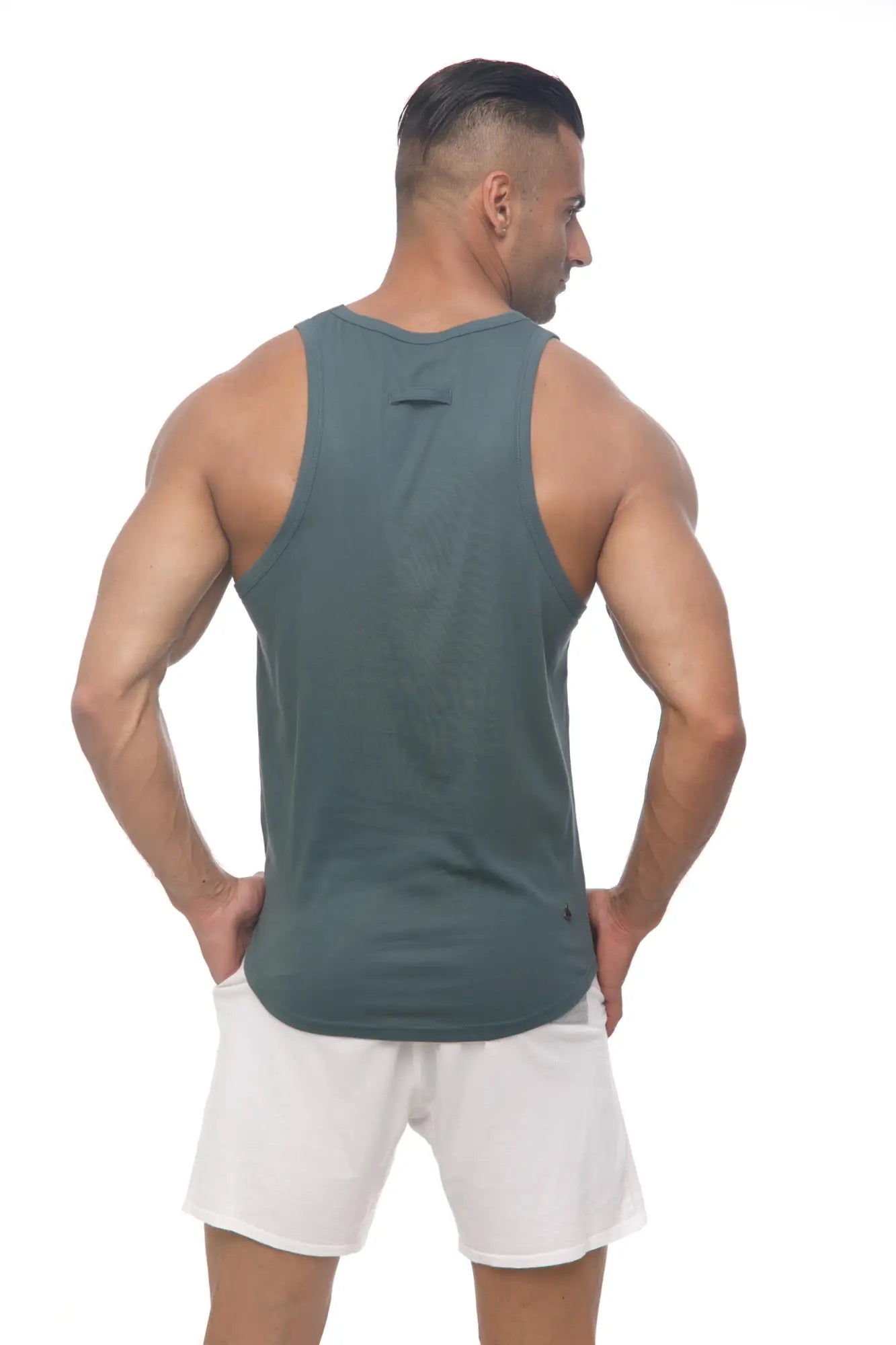 Marcuse Avalon tank top in dark teal sleeveless design with round neckline and subtle seam detailing