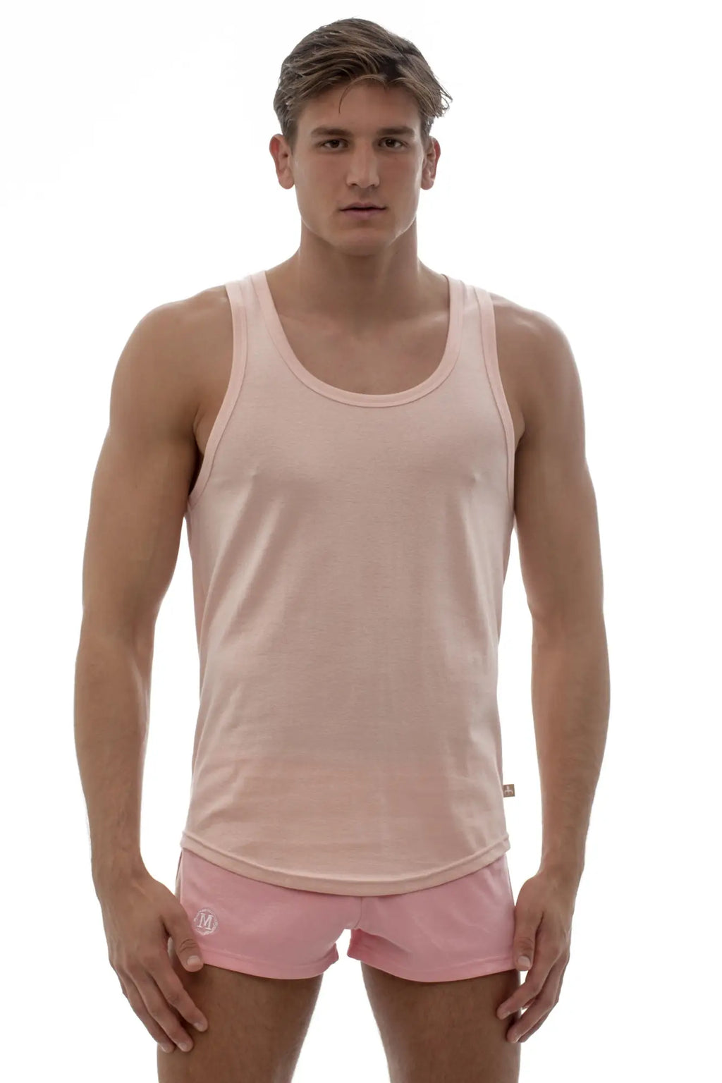 Marcuse Avalon tank top in soft pink sleeveless design with rounded neckline and subtle seam detailing