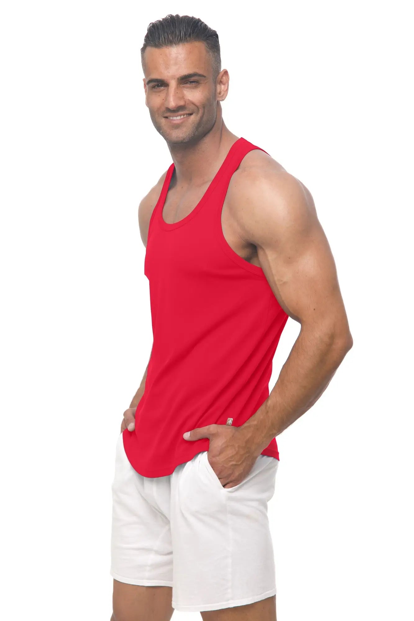 A vibrant red marcuse avalon tank top with sleeveless design, round neckline, and subtle side seam detailing