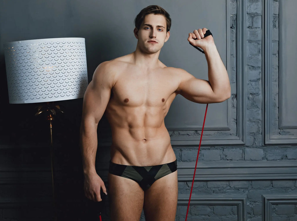 Marcuse axis bikini swimwear mens briefs in black and gray camouflage with a distinctive x-shaped design