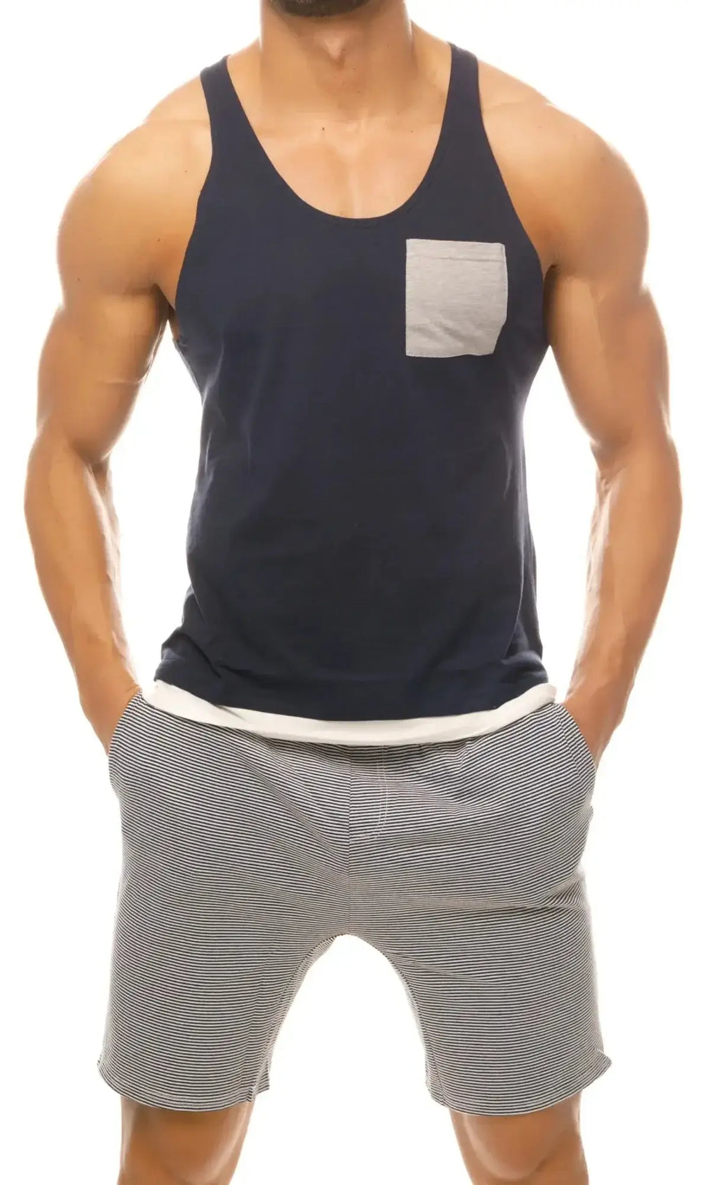 Navy blue Marcuse Babe tank top with a light gray pocket and white trim at the hem for casual wear