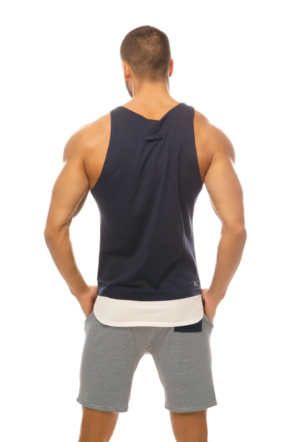 Navy blue sleeveless Marcuse Babe tank top with white inner lining and subtle seam detailing for casual wear