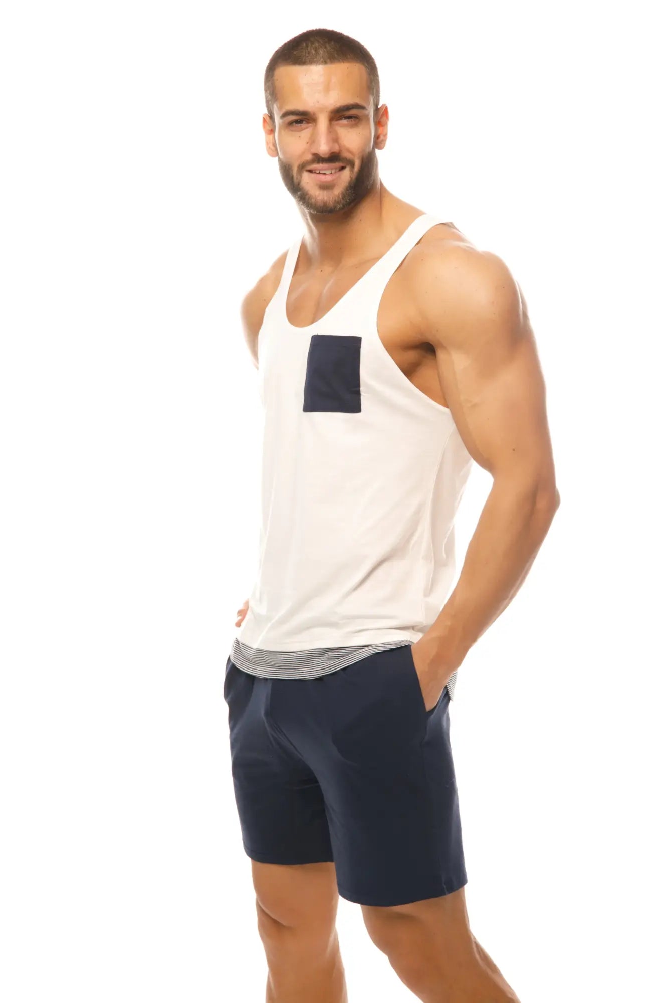 Marcuse Babe tank top in white cotton with a navy blue square patch on the front chest