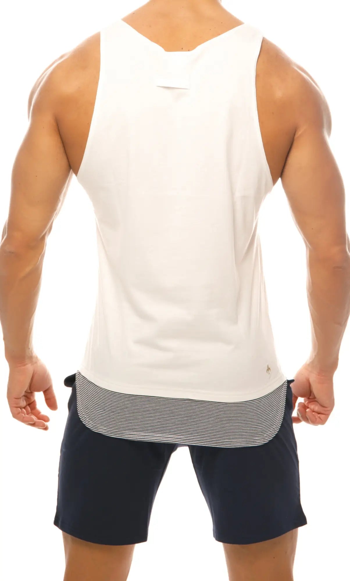 White sleeveless Marcuse Babe tank top featuring a subtle ribbed hemline in soft breathable fabric