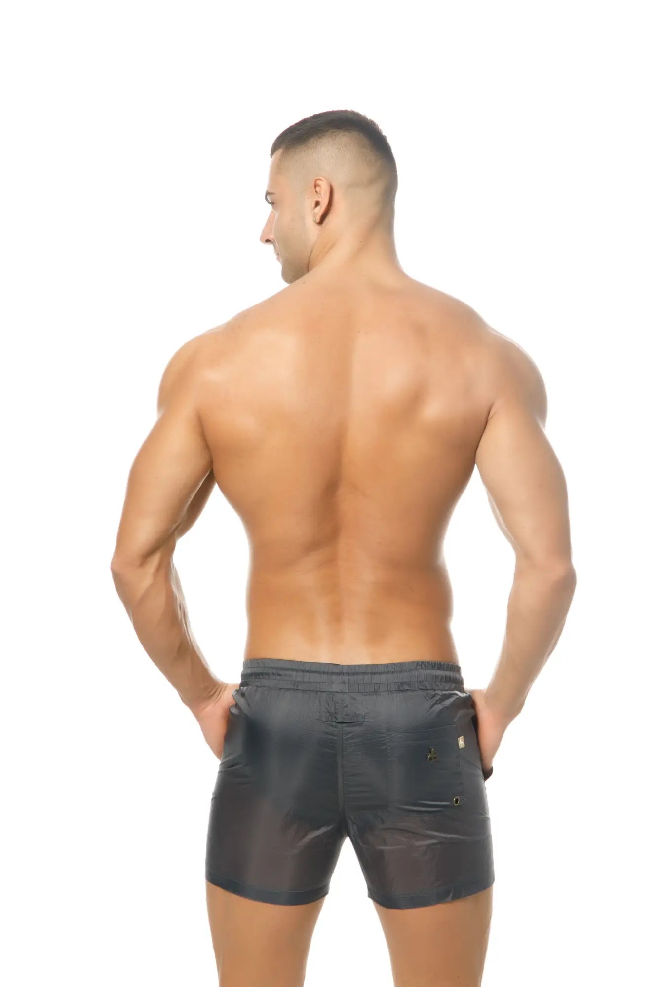 Marcuse Babylon shorts are dark gray sleek form-fitting swim trunks with a subtle sheen for stylish swimwear