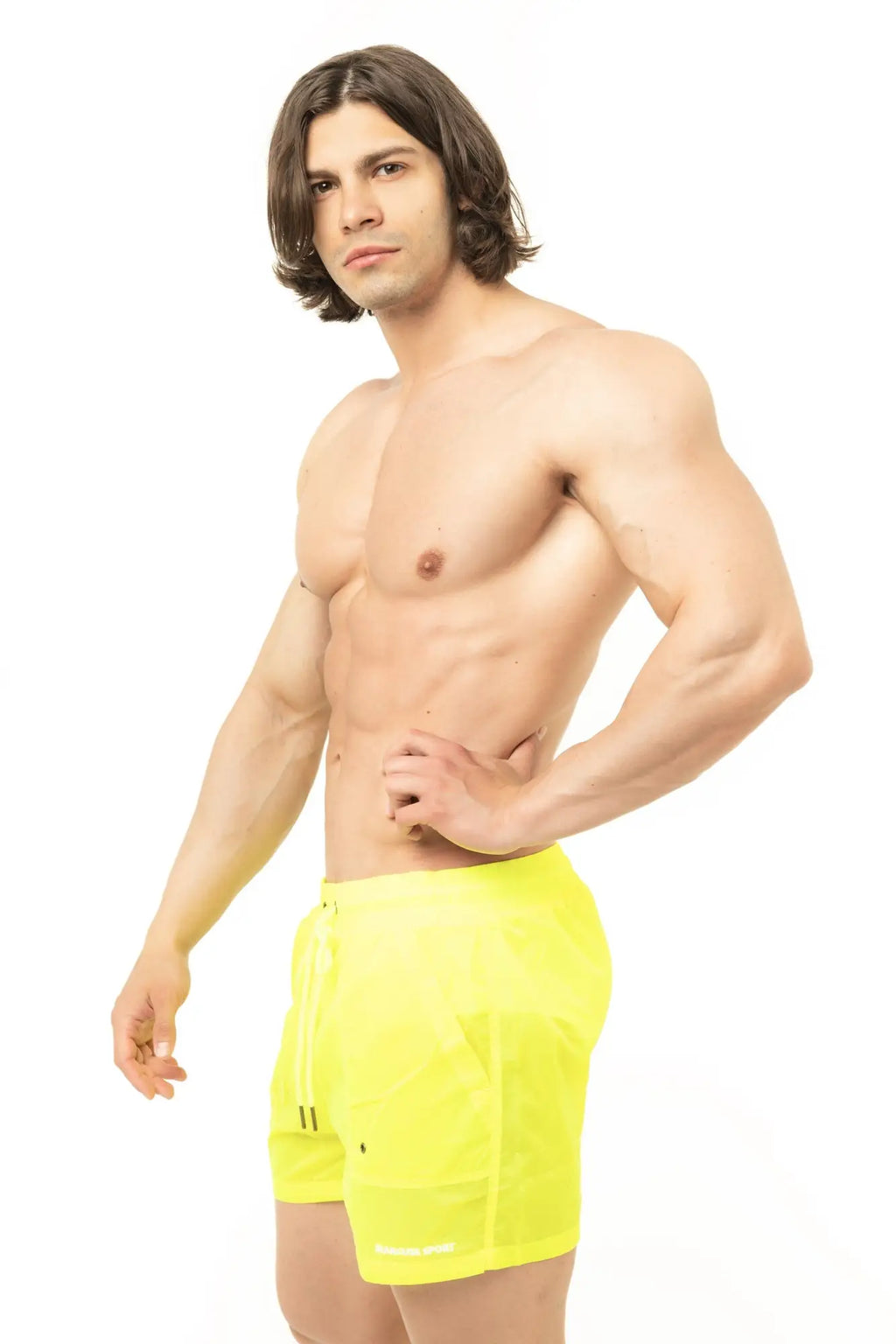 Neon yellow marcuse babylon athletic shorts with drawstring waist and side pockets for active wear